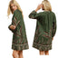Women's abstract botanical print shift dress with split neckline, long balloon sleeves, lace trim and side pockets
