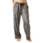 A person models Hello Mello Bow So Lovely Satin Pajama Pant by DM MERCHANDISING INC—loose-fitting, silky pants with an adjustable drawstring, barefoot against a white background for luxurious sleepwear and comfort.
