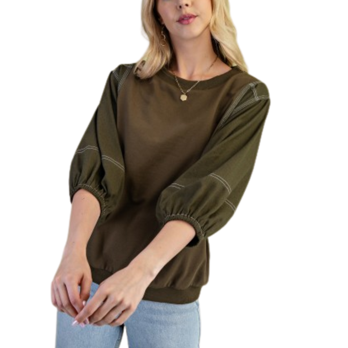 A woman wears the Fashiongo Mixed Fabric 3/4 Sleeve Top in olive green with puffed sleeves and light blue jeans, standing against a white background.