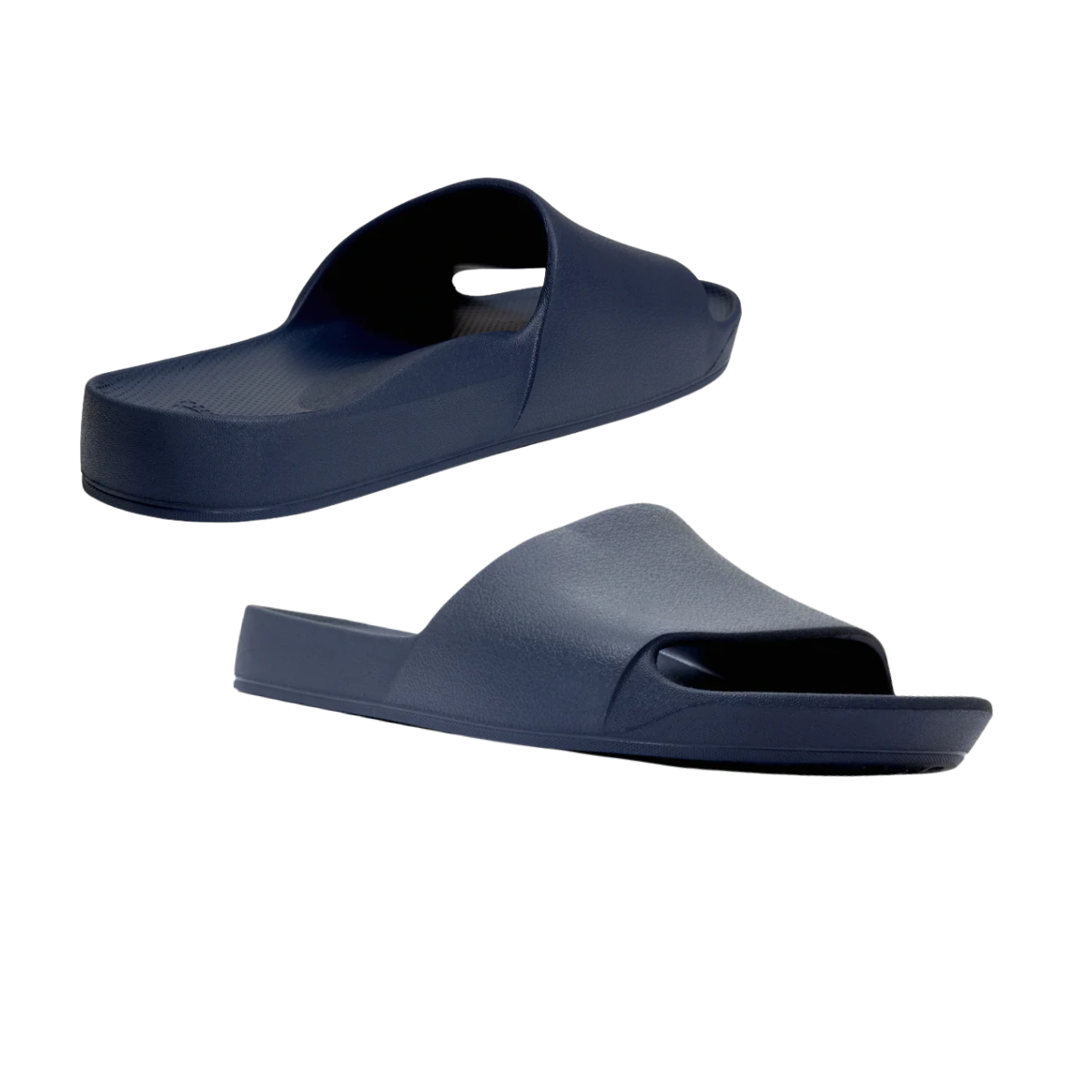 The Archies Slide Sandal in Navy by ARCHIES FOOTWEAR LLC features a thick, contoured sole, wide upper strap, excellent arch support, and an open-toe design, shown from side and angled views.