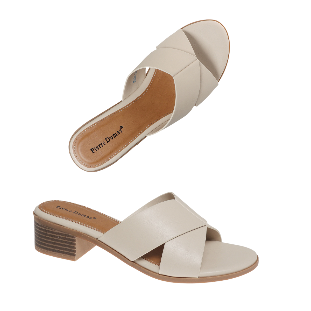 Two beige Silvia Block Heel Slide Sandals by OLEM SHOE CORP with crisscross straps, low stacked heels, cushioned soles, and the brand name displayed on the insole.