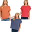 Three women model Zenana's Raised Rib Cap Sleeve Top and other loose-fit, short-sleeve knit tops in orange, red, and blue with jeans against a white background.