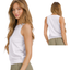 A woman models the FASHION GO Women's Ribbed Viscose Crew Neck Tank with light olive pants, shown from both front and back to highlight the outfit’s style.