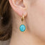 Anarchy Street’s Oval Turquoise Stone Drop Earrings add a vibrant touch for fans of classic turquoise styles and modern statement pieces alike.