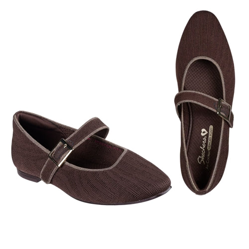 The SKECHERS Cleo Mary Jane Glamorous in Leopard features a textured fabric finish, adjustable buckle strap, and cushioned memory foam insole for all-day comfort.