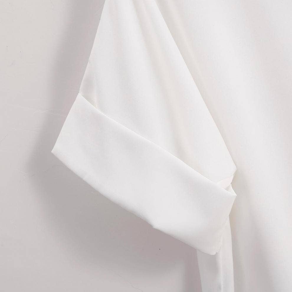 Close-up of the White Relaxed Short Sleeve Blouse by Rosa Clothing, showcasing folded cuff details and a chic, easygoing style against a light background.