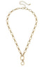 The Lilah Cable Link Charm Necklace Base in Shiny Gold by Canvas Style features oval links, an adjustable clasp, and a large ring pendant at the center for versatile styling.