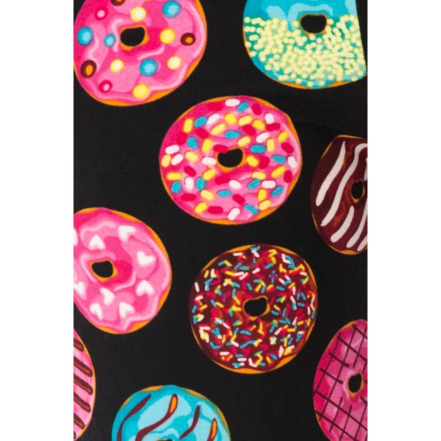 A playful donut pattern decorates the Leggings Depot Buttery Soft Print Pajama Pants, featuring an elastic waistband for comfortโjust like the colorful donuts displayed on a black background.