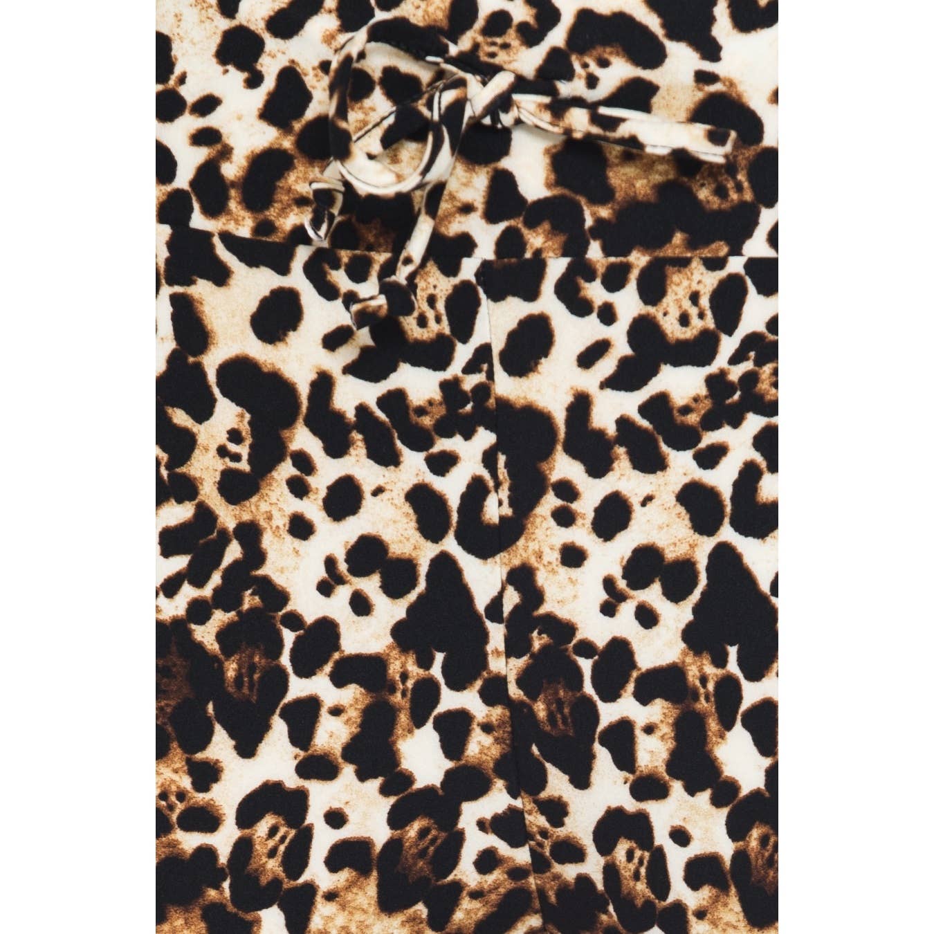 Close-up of Leggings Depot Buttery Soft Print Pajama Pants with a brown, black, and white animal print, featuring an elastic waistband and a drawstring bow.