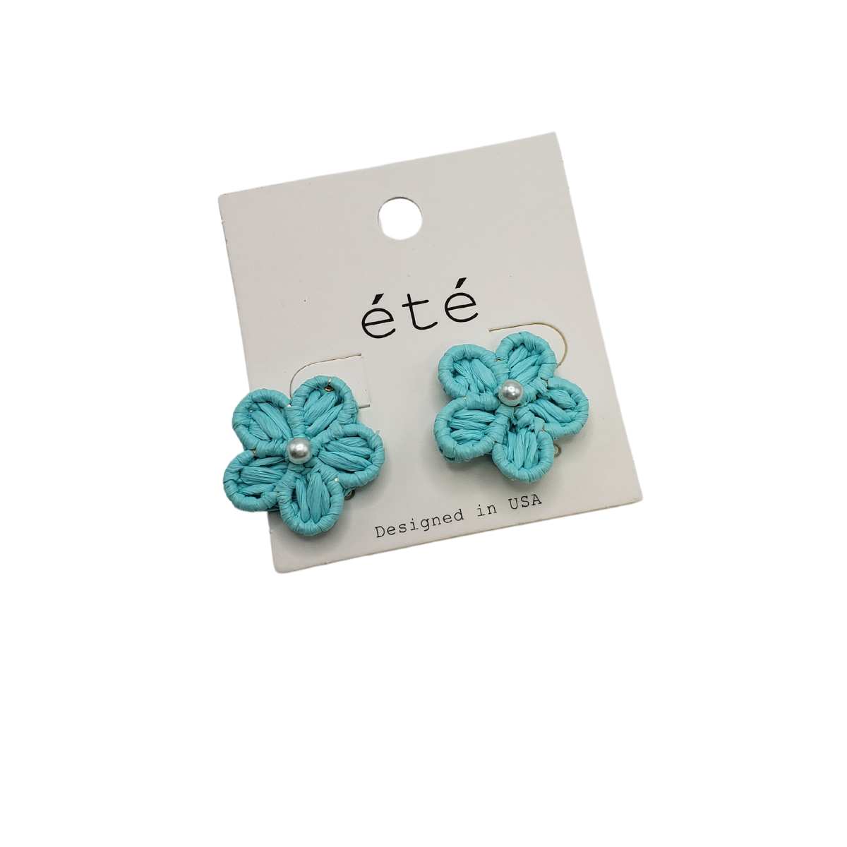 Rattan Flower Earrings with Pearl Center by SPECIAL EFFECTS, a rising fashion trend, are elegantly displayed on a white card labeled "été.