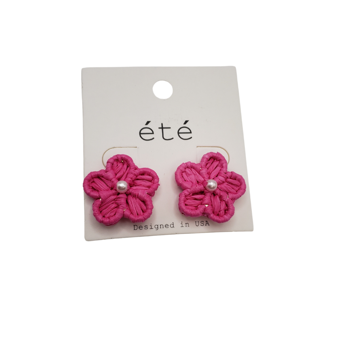 Rattan Flower Earrings with a pearl center from SPECIAL EFFECTS, echoing the latest fashion trend, are elegantly displayed on a white card labeled "été.