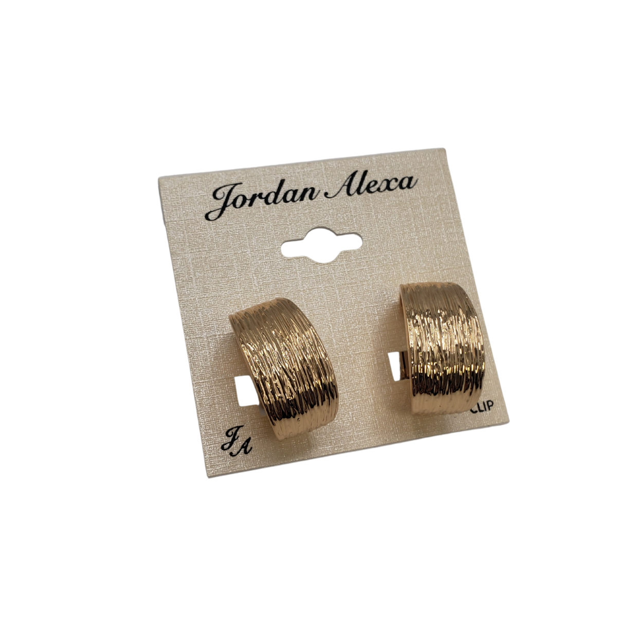 The Etched Hoop Clip on Earrings by SPECIAL EFFECTS, gold in color and textured, exude timeless elegance on a display card. Designed for the modern woman, these thick hoops add a bold yet sophisticated touch to any outfit—ideal for those seeking uncompromised style.