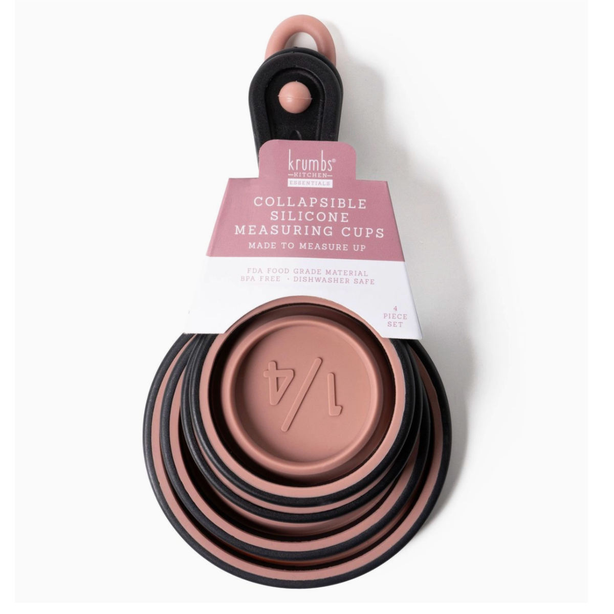 The Krumbs Kitchen Silicone Collapsible Measuring Cups 4pc Set by DM MERCHANDISING INC features pink and black, heat-resistant cups elegantly stacked with measurements labeled. These stylish, practical cups are ideal for any modern kitchen.