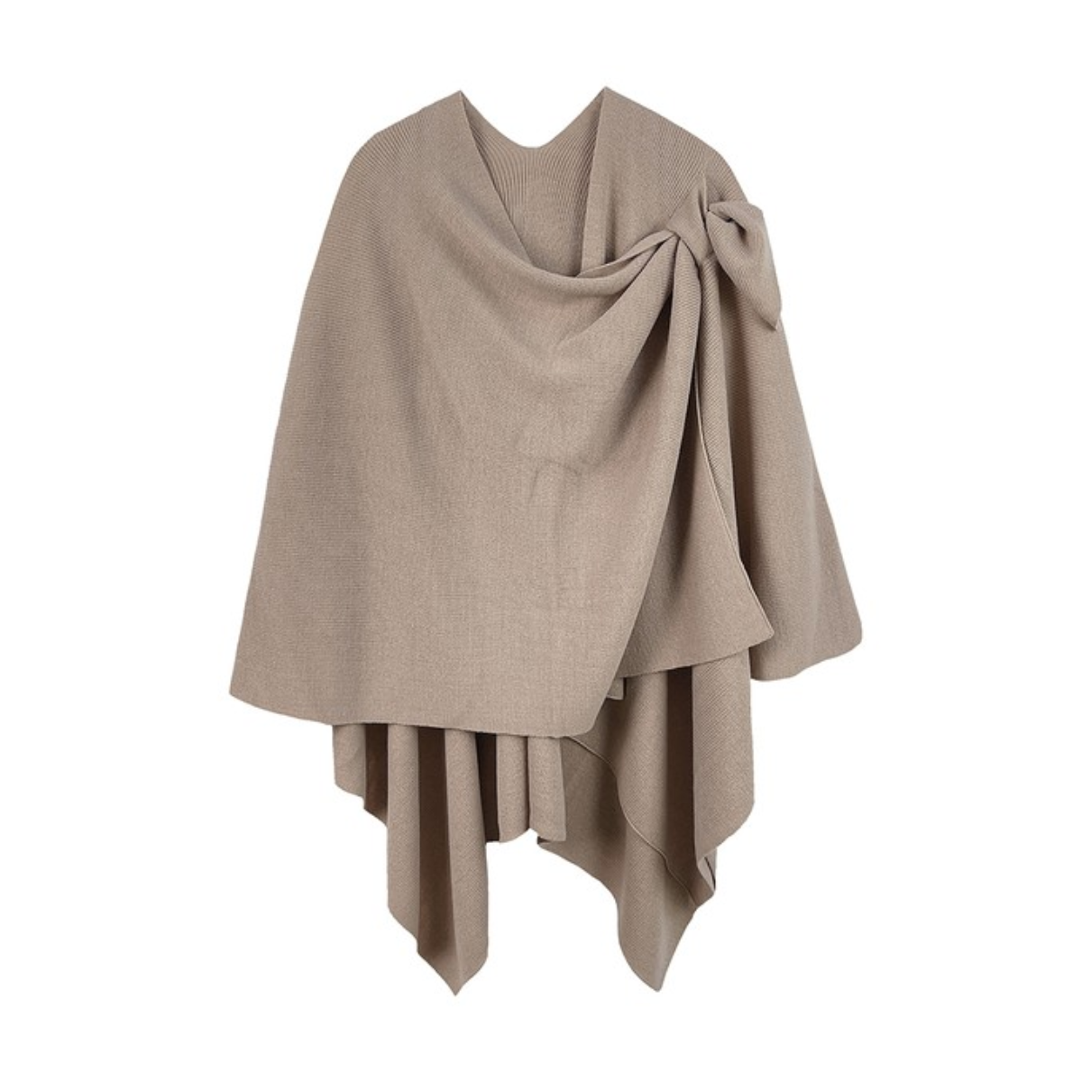 The Soft Solid Color Ruana with Strap Hold by FASHION GO is a beige knitted shawl featuring an asymmetrical draped design and a bow on one side.