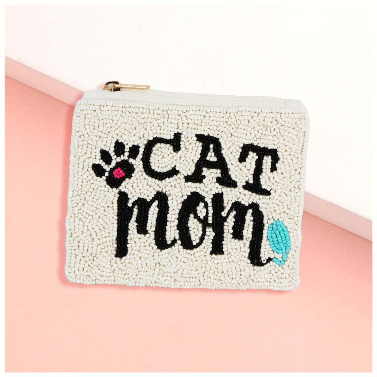 The Wona Trading Seed Bead Accented Mini Pouch Bag features "CAT mom" text, a cat paw graphic, and blue accents on a pink and white base—an adorable gift for any fashionista.