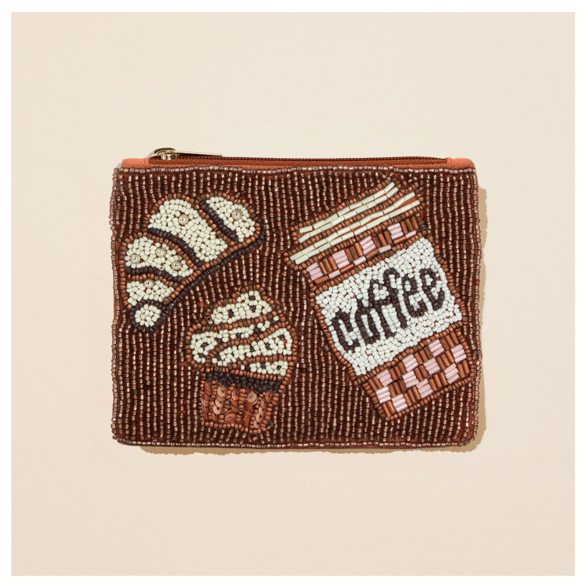 The Seed Bead Accented Mini Pouch Bag Assorted by Wona Trading features coffee, croissant, and muffin seed bead designs—perfect as a chic gift for your style-savvy friends.