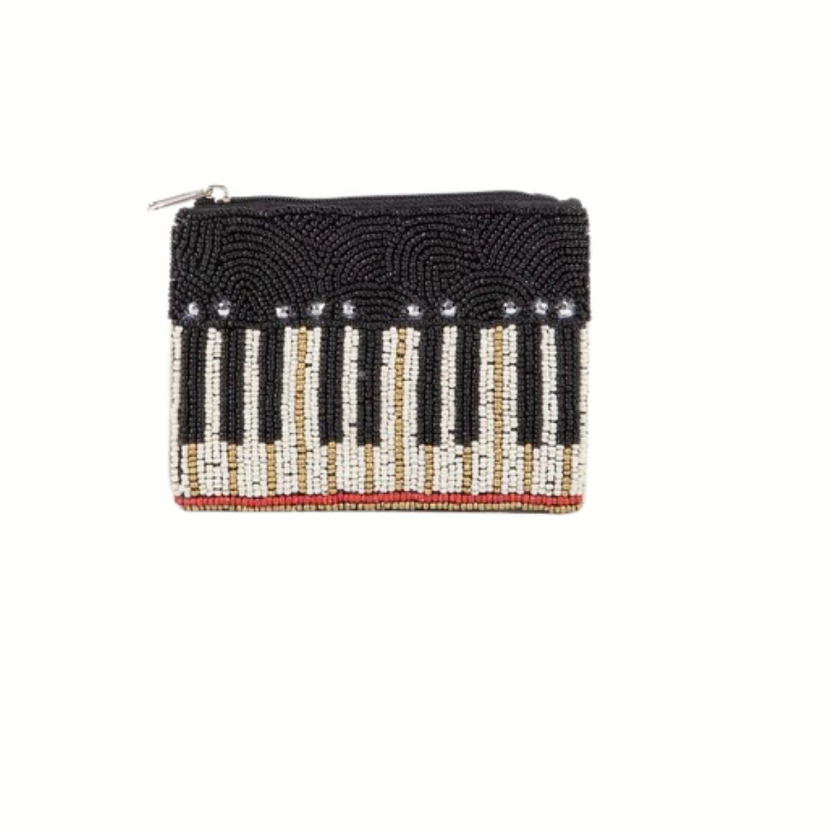 The Wona Trading Seed Bead Accented Mini Pouch Bag Assorted is a stylish zippered pouch featuring black and white beads in a piano key design—an ideal chic gift for music lovers.