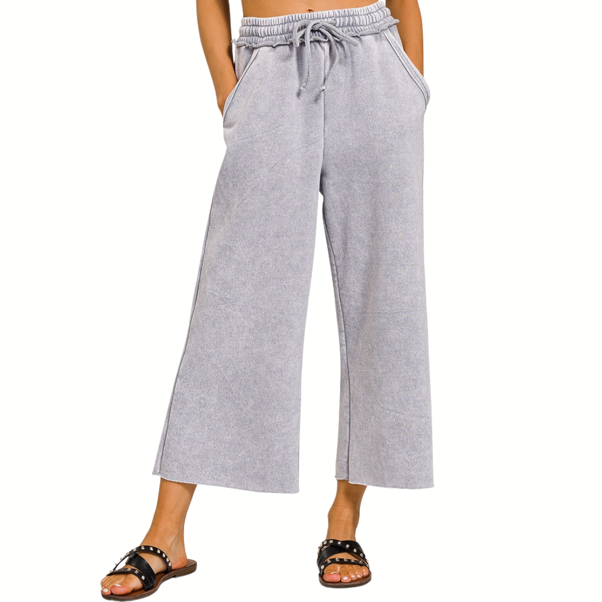 Lower body shown wearing FASHION GO Acid Washed Fleece Palazzo Sweatpants in light grey with a drawstring waist and wide-leg cropped fit, paired with black slide sandals.