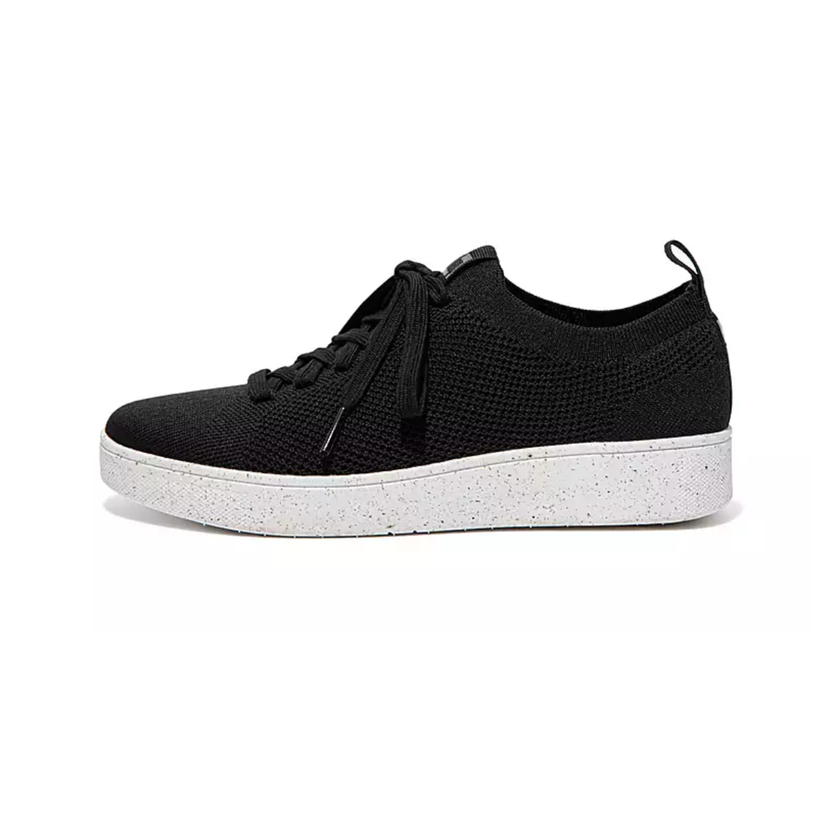 A side view of the black Rally e01 Knit Tennis Shoes by FITFLOP USA LLC, featuring a white speckled sole, highlights the future of sustainable footwear.