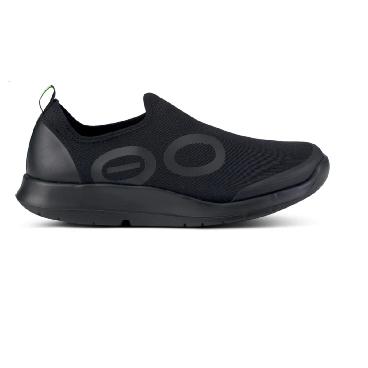 The OOFOS OOmg Eezee Low Black - Men's slip-on shoe by OOFOS LLC features a sleek design with a large "O" on the side, crafted from woven canvas-like material for style.