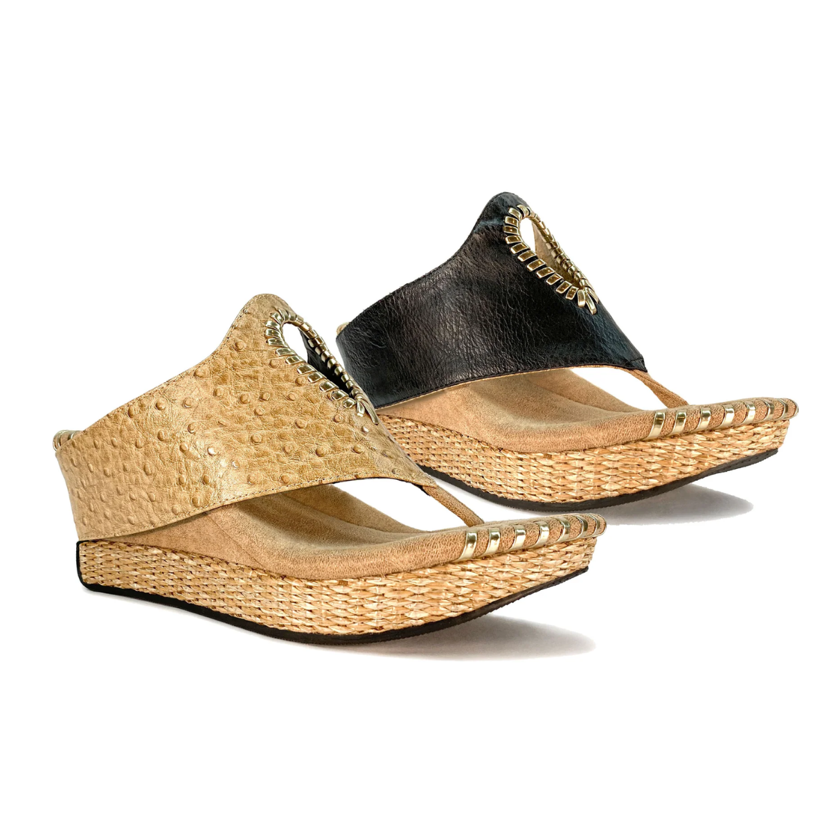 The Lucia #4 Reversible Wedge in Tan/Black by MODZORI offers two pairs of mid wedge sandals with textured straps, woven soles, and a heart-shaped cutout. Available in beige and black, these comfortable pull-on sandals add style to any outfit.