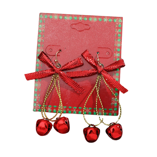 Shewin's Red Christmas Bow and Bells Dangle Earrings come on a festive red card with a green border, adding whimsy to your holiday ensemble.