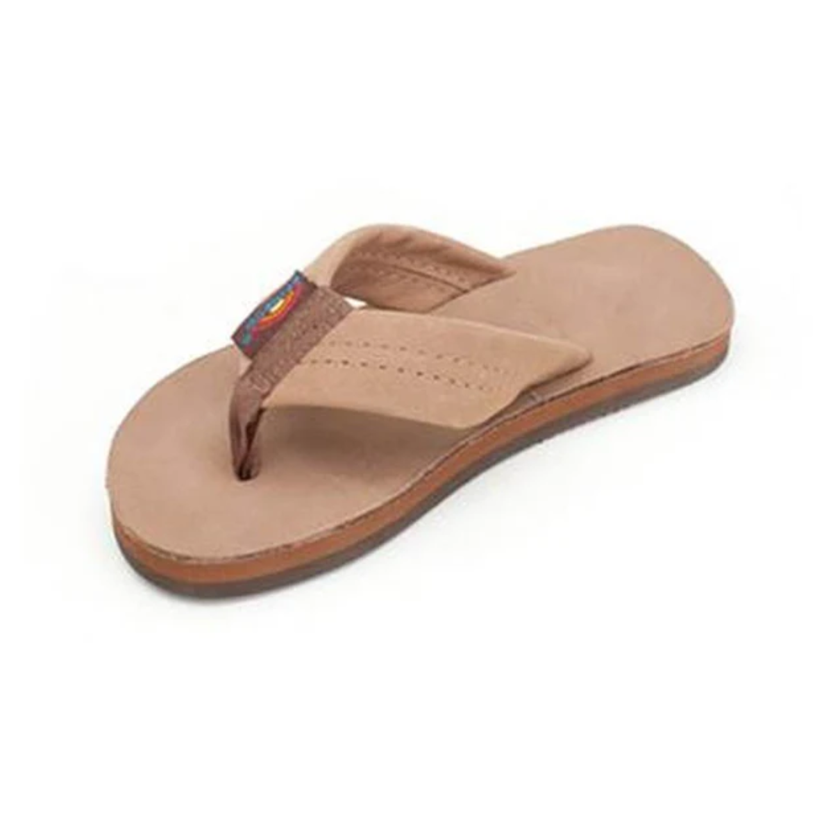 A side view of a Kids Rainbow Leather Flip Flop in Dark Brown by RAINBOW SANDALS, featuring a fabric strap and a non-slip sole.