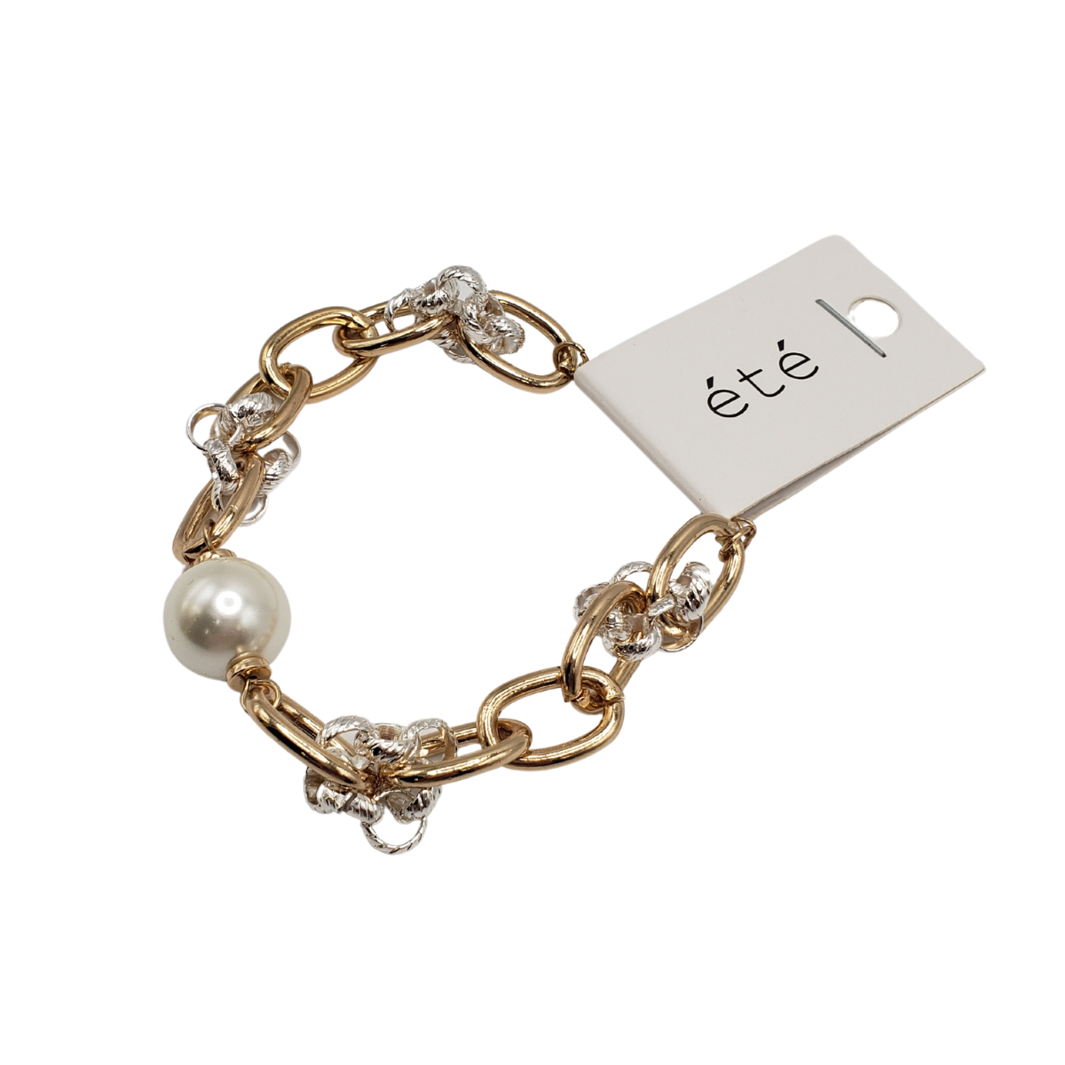The SPECIAL EFFECTS Pear and 2 Tone Chain Link Bracelet features gold and silver links, accented with a pearl, and a tag marked "été.