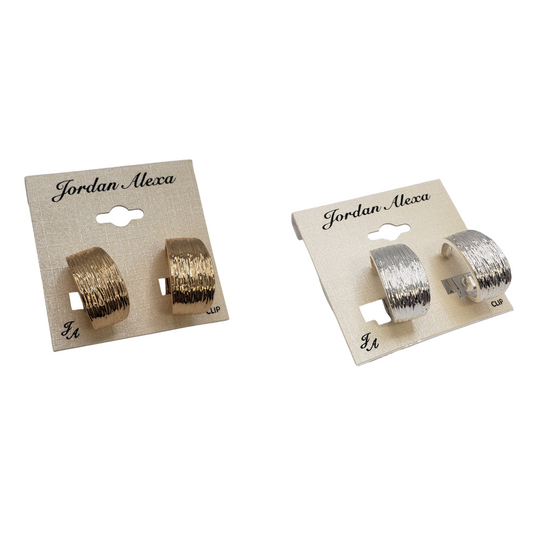 On display are two pairs of stylish clip-on earrings from SPECIAL EFFECTS on elegant cards. One pair has small gold-colored hoops, and the other features thick silver-colored hoops, both labeled "Etched Hoop Clip on Earrings.