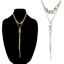 Flipflops & Whatnots' Metal Y Shaped Necklaces, featuring gold and silver chains with layered designs, are displayed on a black stand and set against a white background.