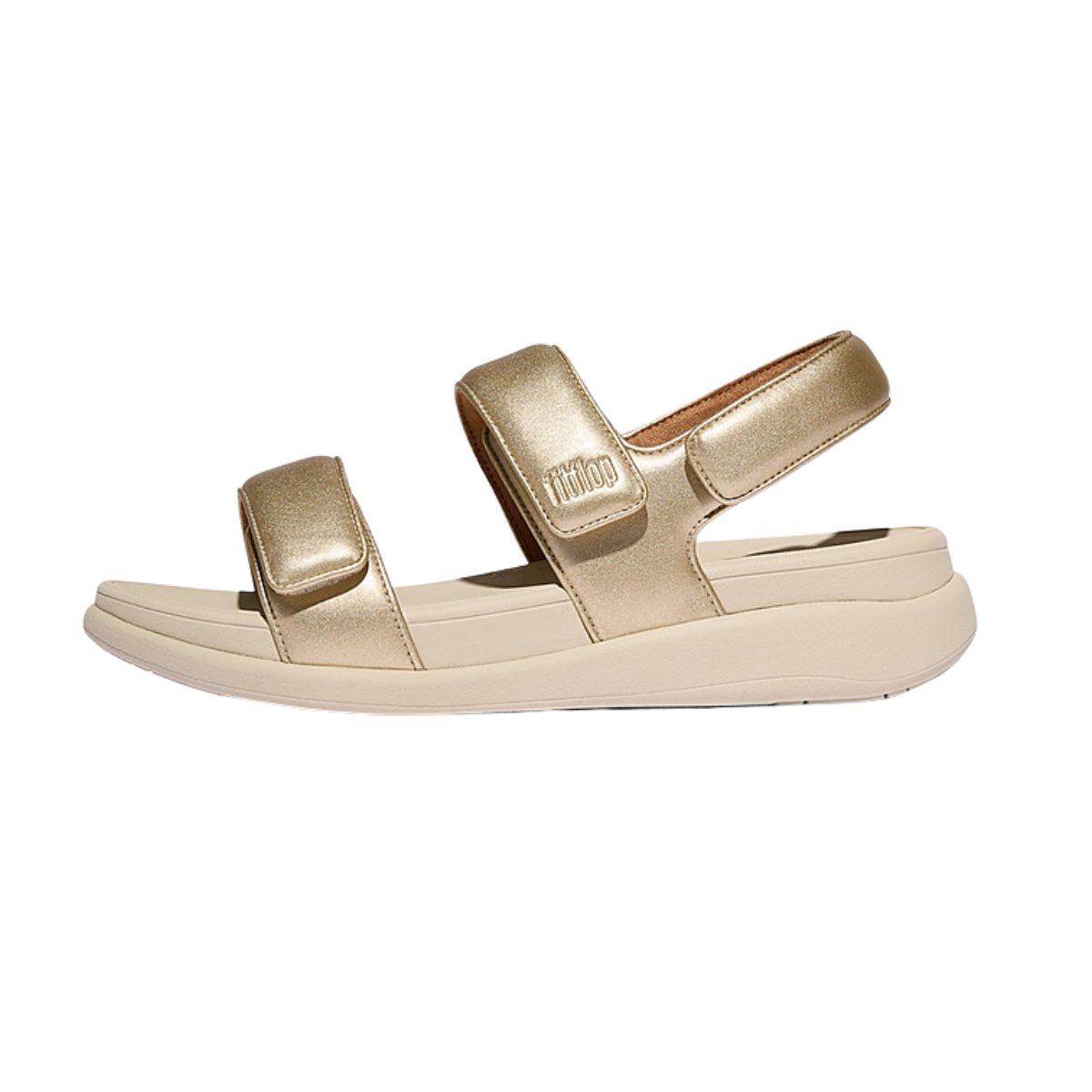 FITFLOP USA LLC's F Mode Go Adjustable Flatform Back Strap Sandals in Platino feature dual adjustable upper straps, a cushioned beige sole, and a Microwobbleboard midsole for extra comfort.
