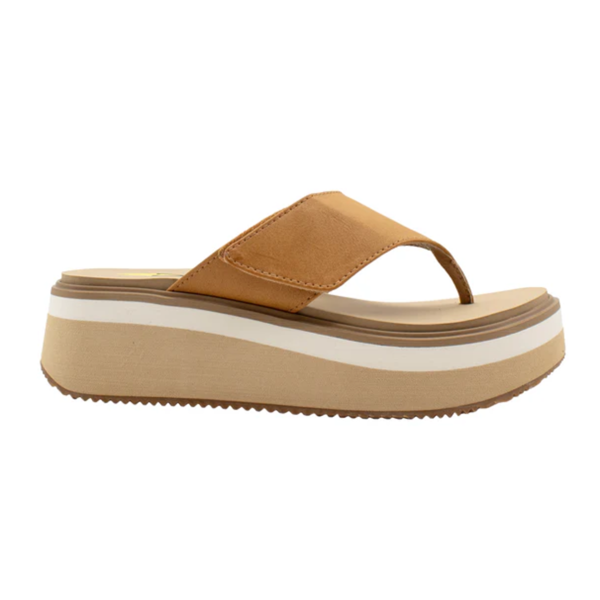 The Shitake Wedge Flip Flop in Tan by Volatile is a thong sandal featuring a platform design, thick sole with contrasting white stripe, and wide strap, complete with adjustable Velcro closure and comfortable EVA insole for all-day wear.