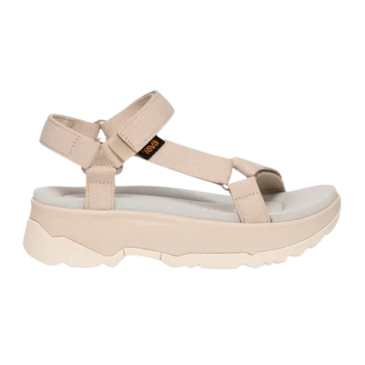 The Jadito Sandal in Birch/White by TEVA is a beige platform sandal with recyclable plastic straps, a memory foam footbed, adjustable closures, and a thick sole.
