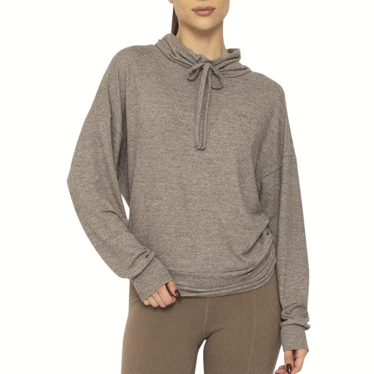 A person wears the Mono B Brushed Cowl Neck Lounge Pullover in Olive with a relaxed fit, paired with brown leggings, standing against a plain white background.