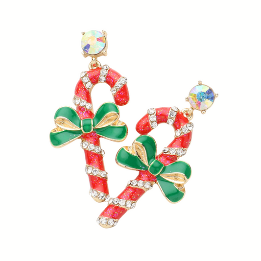 Wona Trading's Candy Cane Dangle Earrings feature festive red and white stripes, green bows, gold accents, and sparkling rhinestones—perfect for a charming holiday look.