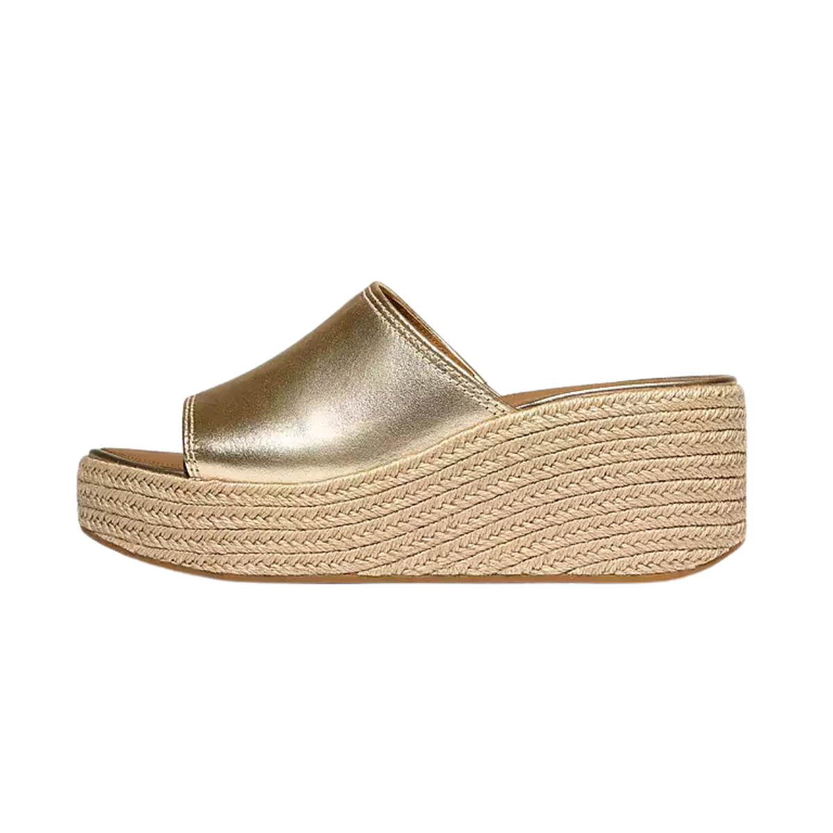 The PLATFFORMS Espadrille Metallic-Leather Wedge Slides by FITFLOP USA LLC are gold metallic leather slide sandals with an open toe and thick woven espadrille platform sole, shown in a side view against a white background.