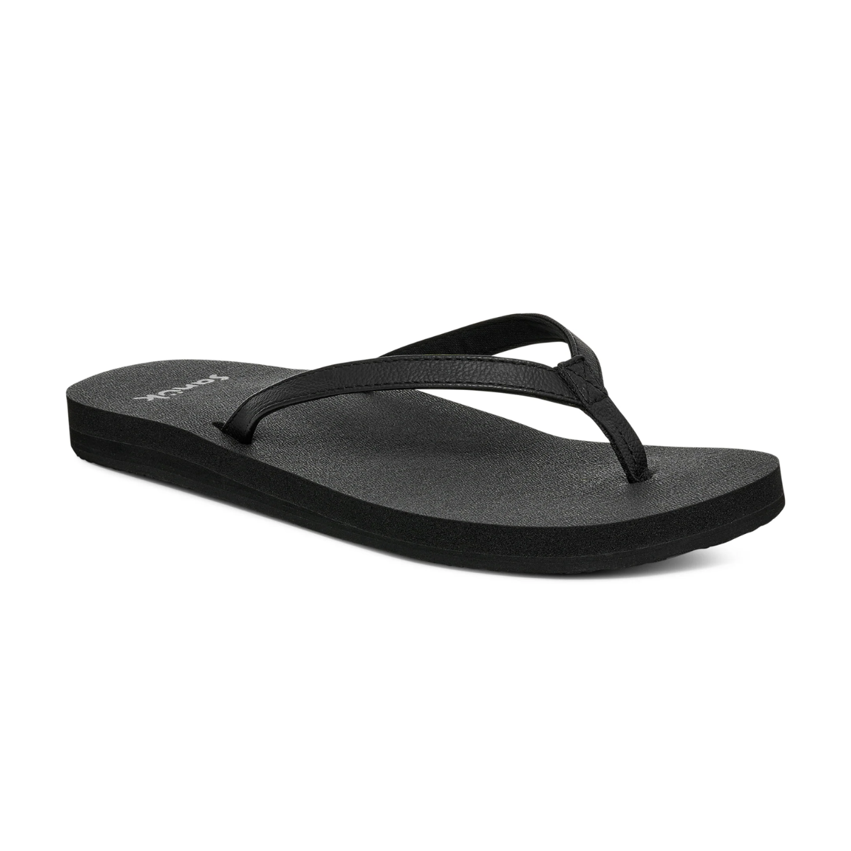 The SANUK - DECKERS Yoga Joy 2 Ladies flip flop in black features a thong strap, rubber sole, and an eco-friendly yoga mat footbed, displayed against a white background.