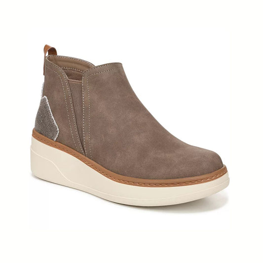 The Charming Wedge Bootie by Blowfish from CALERES INC features taupe suede, a thick white platform sole, brown trim, elastic side panels, a textured heel patch, and a cushioned insole for superior comfort.
