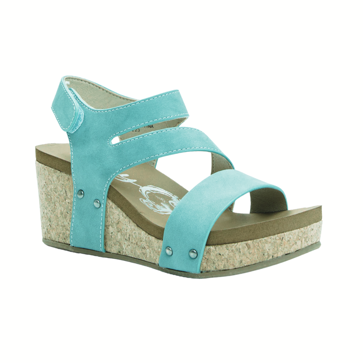 The Casper Wedge Sandal in turquoise by VERY G is a comfy sandal with a 3" heel, cork sole, and two stylish straps.