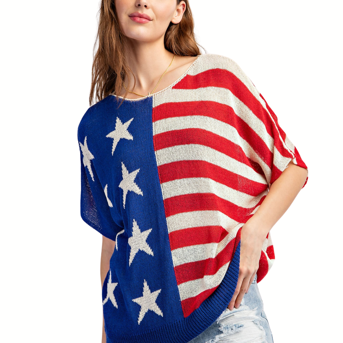 A woman wears the FASHION GO American Flag Prints Stripes Lightweight Sweater, a sleeveless top with blue and white stars on one side and red and white stripes on the other in a loose-knit style.