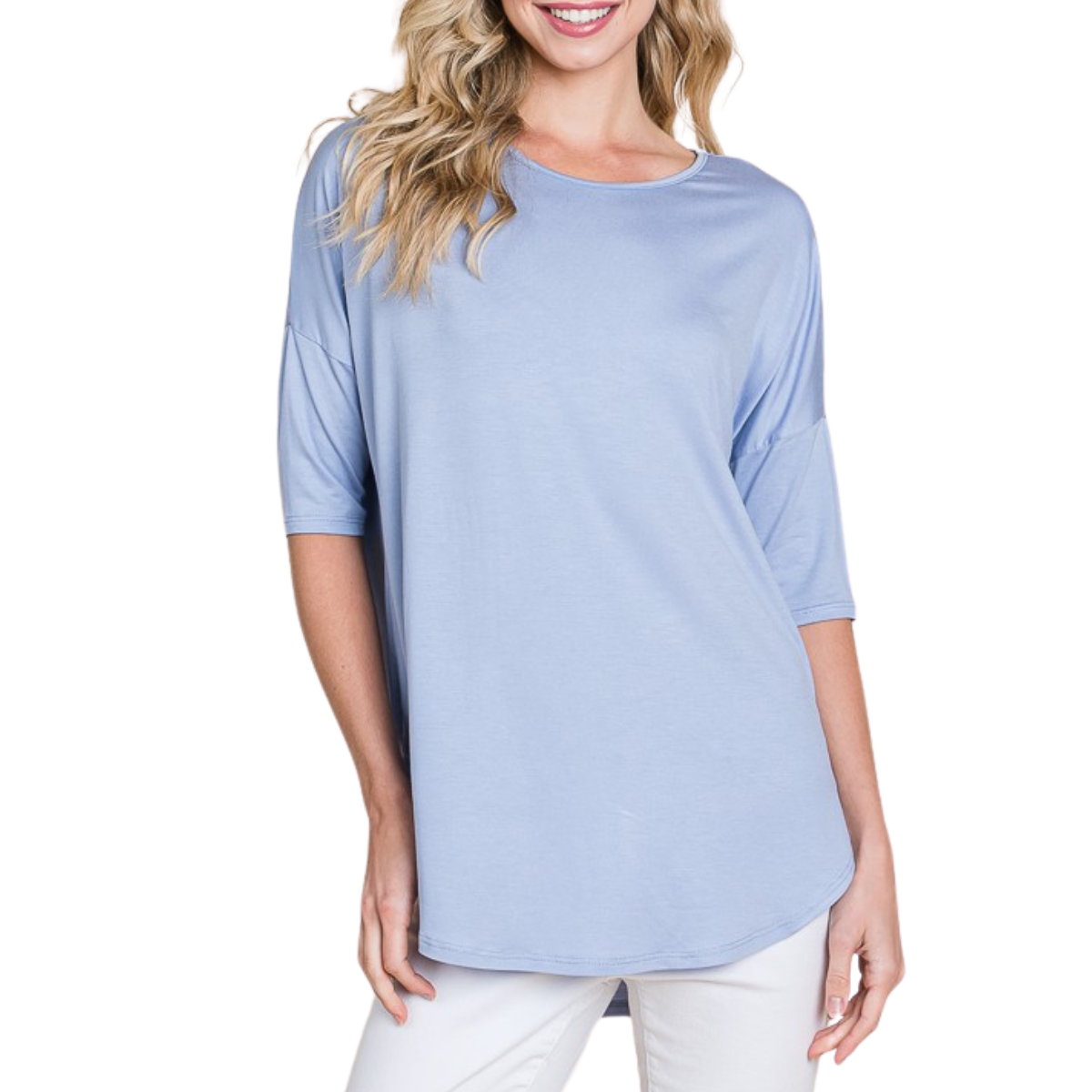 A woman wearing the FASHION GO Basic Crew Neck T-Shirt in light blue, made from soft rayon spandex with a loose fit and short sleeves, paired with white pants, stands against a white background.