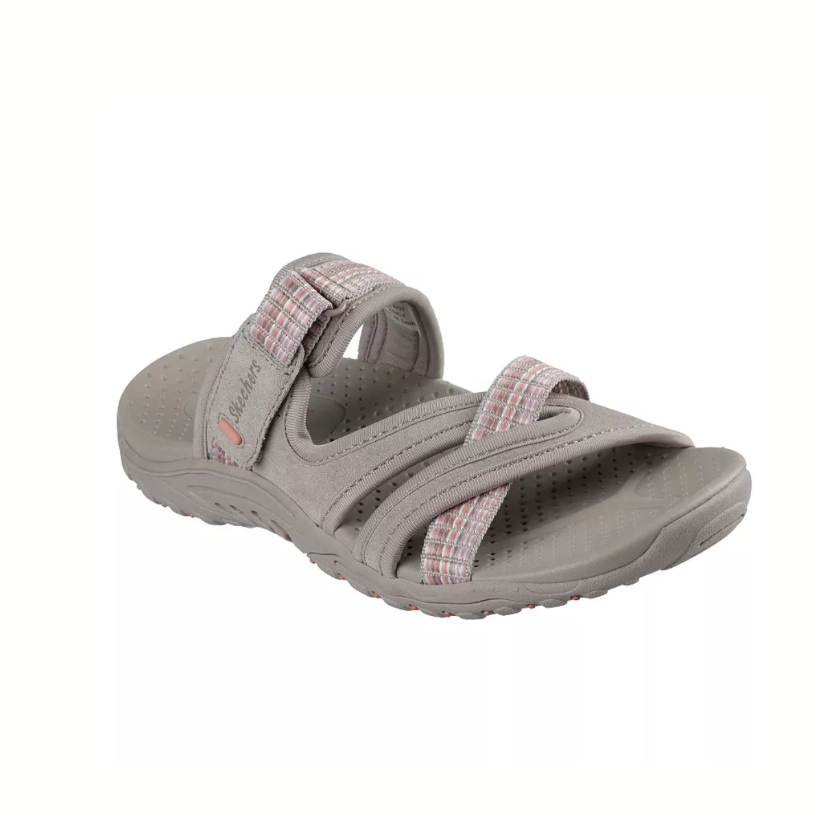 The Skechers Reggae Colorful Taupe Sandal by SKECHERS USA INC features a gray design with a cushioned footbed, single top strap, and pink/beige Velcro ankle strap. Ideal for outdoor trails, it has a shock-absorbing midsole for comfort on rugged paths.
