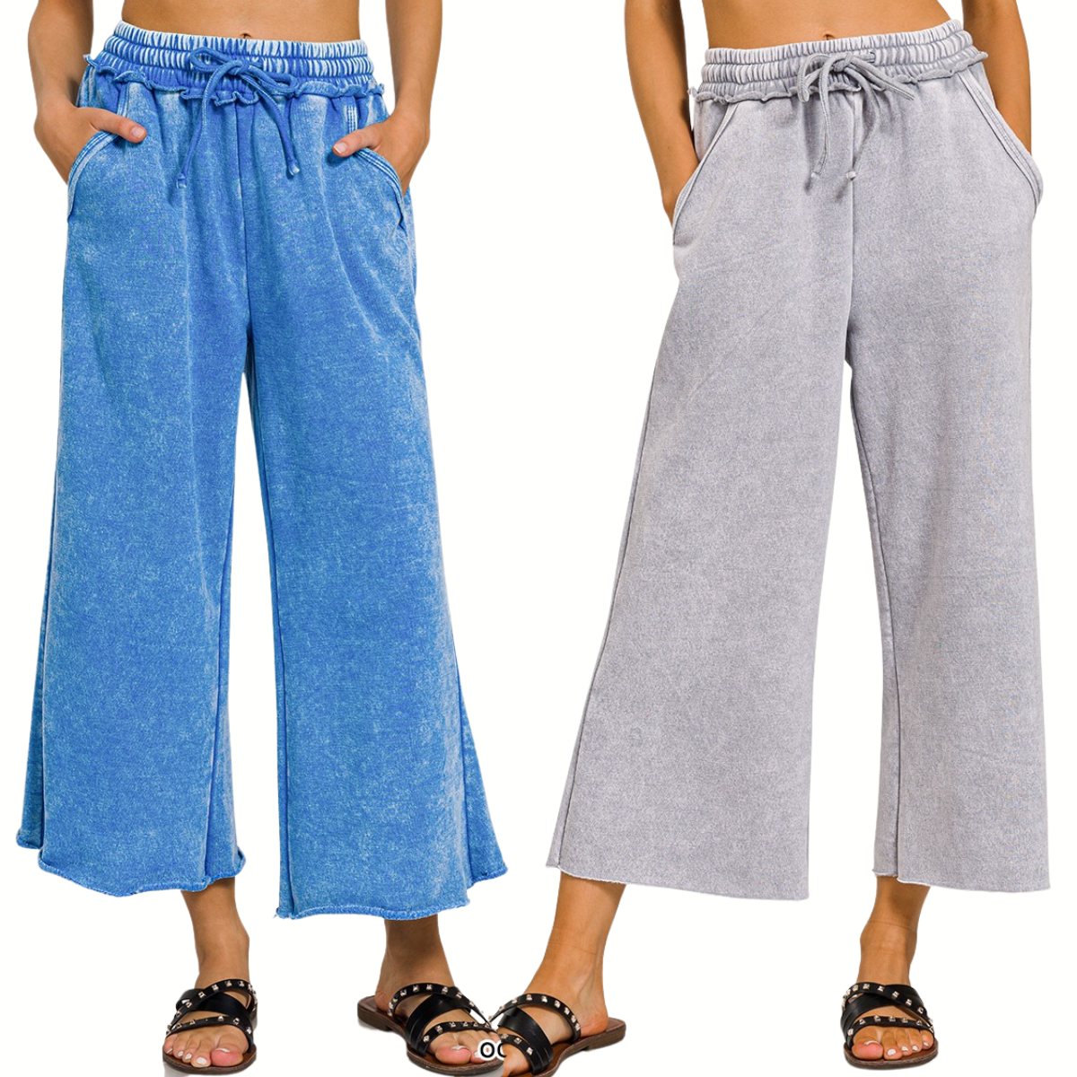Two women stand side by side wearing FASHION GO's Acid Washed Fleece Palazzo Sweatpants with pockets—one in blue, one in light gray. Both pair the cozy pants with sandals.