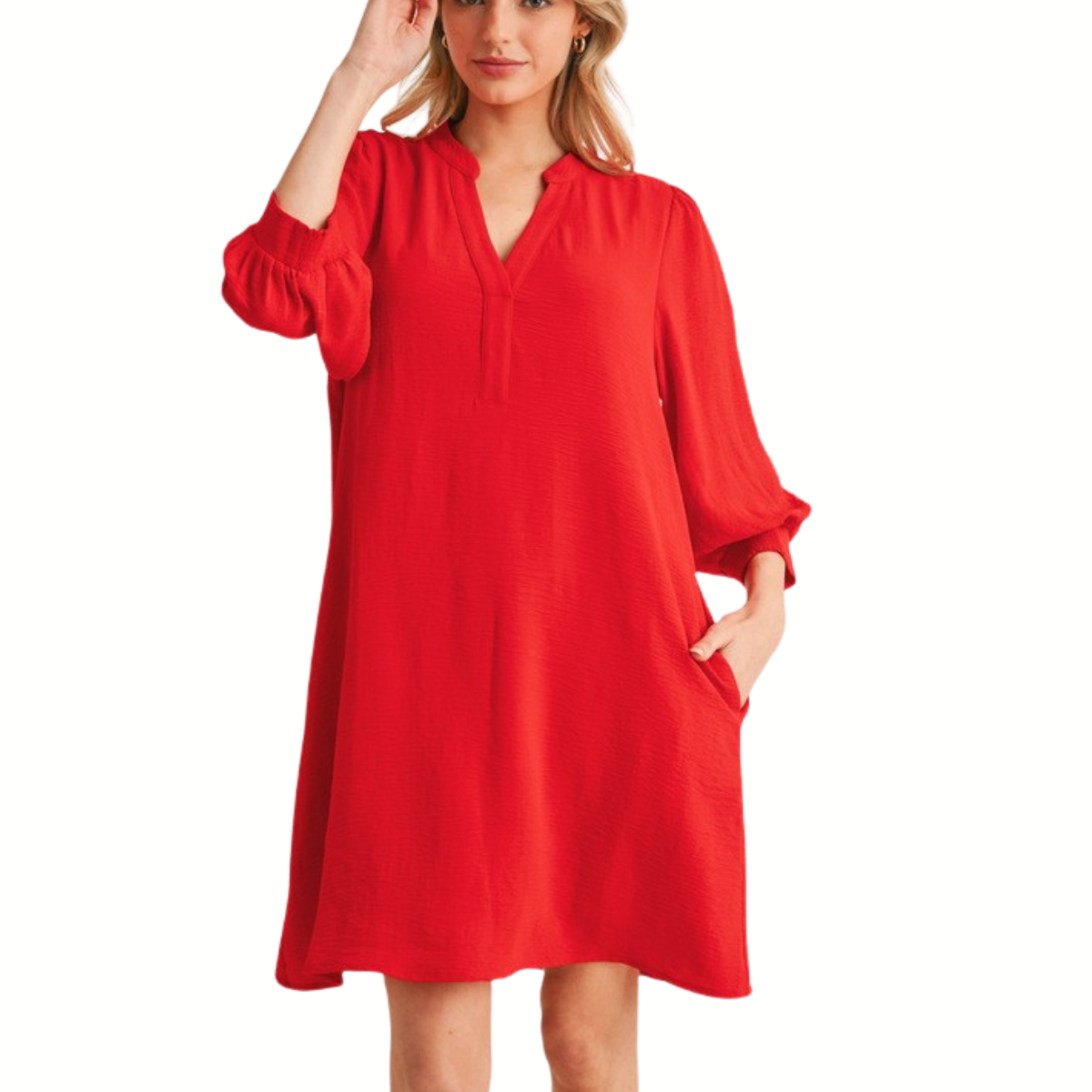 A woman models the FASHION GO Solid 3/4 Peasant Sleeves Dress with a V-neckline and pockets, standing against a white background.