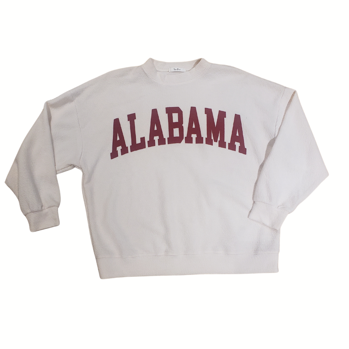 Show your varsity spirit on gameday in the Tres Bien ALABAMA Cloudy Knit Long Sleeve Top, featuring a white crewneck and bold maroon "ALABAMA" lettering across the chest.