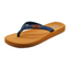 The Billie Navy Blue Flip Flop by FLOJOS from the Vintage Baja Collection features a brown sole, blue straps with a small brown logo tag on one strap, offering ultimate comfort and effortless style.