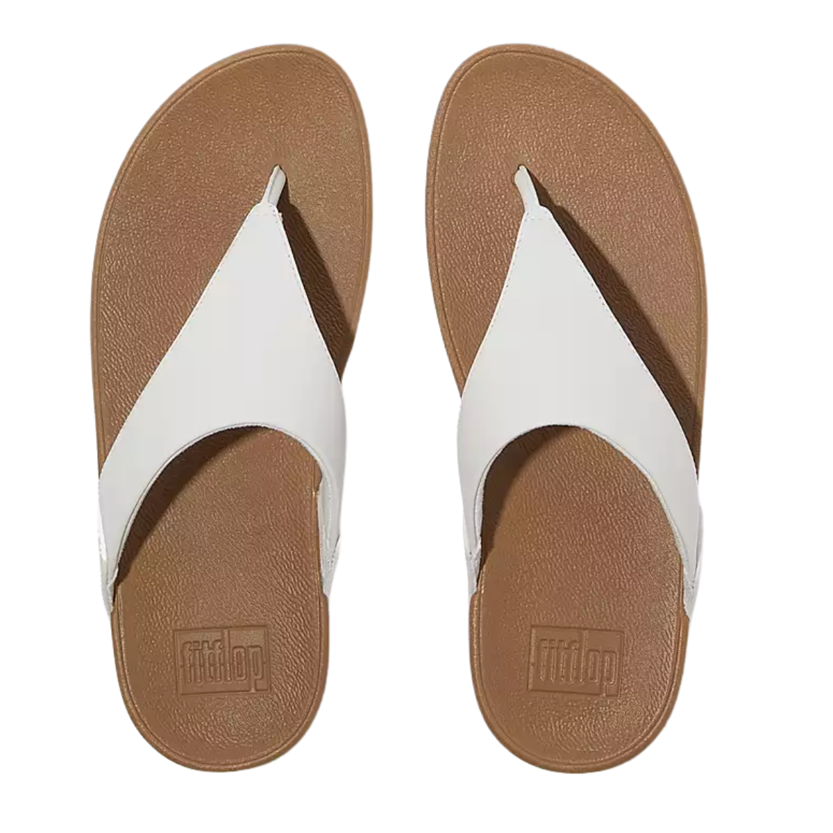 The FitFlop Lulu Leather Toe Post Thong Flip Flops in white feature ergonomic midsoles, a thong design, and the FITFLOP USA LLC logo embossed on the footbed.