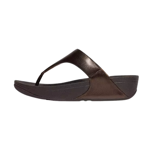 The Fit Flop Lulu Flip Flop in Summer Bronze Metallic Chocolate Brown by FITFLOP USA LLC features an ergonomic midsole and a metallic-finished strap, shown from the left side view.