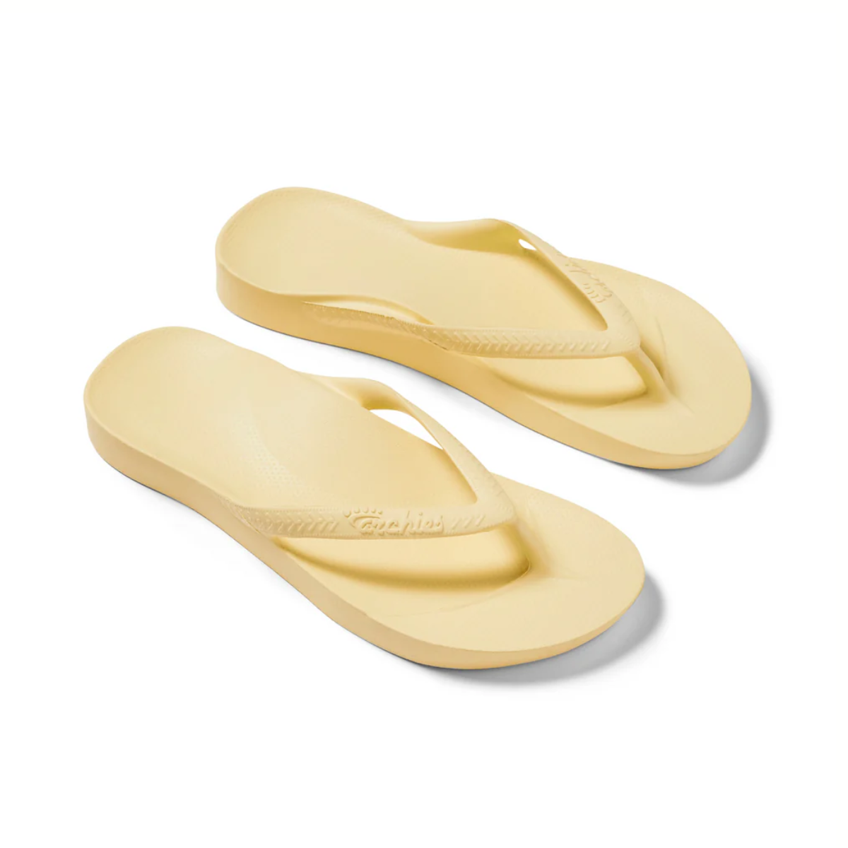 A pair of Archies Flip Flops in Lemon, featuring textured straps and soles with comfy arch support, are displayed side by side on a white background from brand ARCHIES.