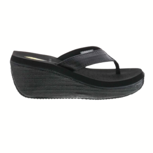 Black platform wedge Bahama flip-flop sandal by Volatile - Rosenthal & Rosenthal isolated on a white background.